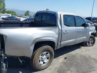 2018 Toyota Tacoma SR with VIN 5TFAX5GN2JX103685, listed as a IAAI auction lot 42392032 with 138,678 mi miles and . Bid and sale history available at DreamBid. Image 12.