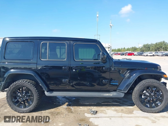 2021 Jeep Wrangler Unlimited Sahara with VIN 1C4JJXP68MW863992, listed as a IAAI auction lot 40618902 with 30,112 mi miles and . Bid and sale history available at DreamBid. Image 14.