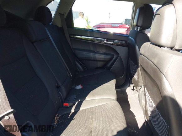 2014 Kia Sorento LX with VIN 5XYKTCA63EG506217, listed as a IAAI auction lot 42050413 with 126,806 mi miles and . Bid and sale history available at carsss.com. Image 8.