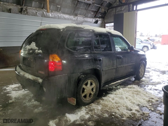 2005 GMC Envoy Denali with VIN 1GKET63M152386829, listed as a Copart auction lot 41901885 with 51,088 mi miles and Salvage Title. Bid and sale history available at carsss.com. Image 3.