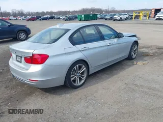 2014 BMW 3 Series 328i xDrive with VIN WBA3B3C58EJ980379, listed as a IAAI auction lot 41678676 with 183,278 mi miles. Bid and sale history available at carsss.com. Image 4.