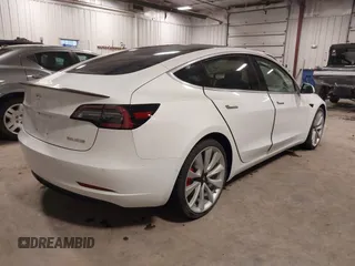 2018 Tesla Model 3 Long Range Battery with VIN 5YJ3E1EB5JF084446, listed as a IAAI auction lot 41209852 with 70,125 mi miles and . Bid and sale history available at DreamBid. Image 4.