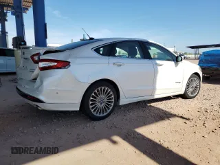 2013 Ford Fusion Titanium Hybrid z VIN 3FA6P0RUXDR376633, wystawiony jako Copart lot #57685555 z przebiegiem 133 248 mil mil oraz Szkoda całkowita • Salvage title. Historia ofert i sprzedaży dostępna na DreamBid. Obrazek 3.