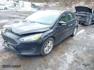 2016 Ford Focus SE with VIN 1FADP3FE7GL236032, listed as a IAAI auction lot 41597830 with 116,312 mi miles. Bid and sale history available at carsss.com. Image 2.