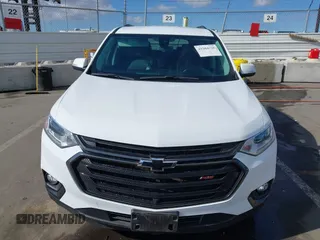 2021 Chevrolet Traverse RS z VIN 1GNEVJKW0MJ266088, wystawiony jako IAAI lot #41504928 z przebiegiem 57 966 mil mil oraz . Historia ofert i sprzedaży dostępna na DreamBid. Obrazek 12.