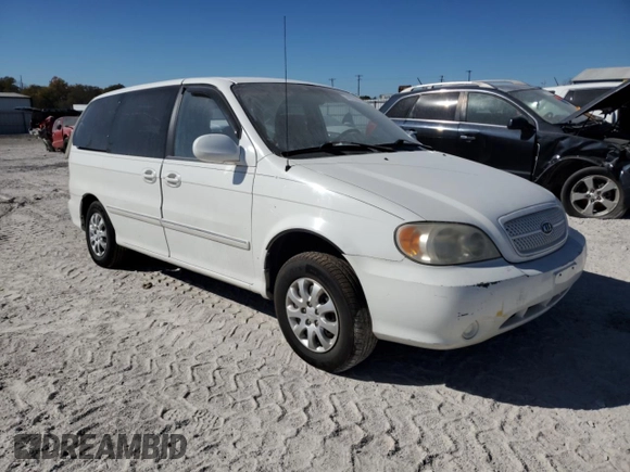 2004 Kia Sedona LX with VIN KNDUP131046585706, listed as a Copart auction lot 74973304 with 107,130 mi miles and Salvage Title. Bid and sale history available at carsss.com. Image 4.