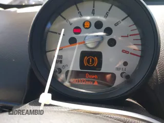 2012 MINI Countryman S with VIN WMWZC5C54CWM11869, listed as a IAAI auction lot 42265935 with 100,102 mi miles and . Bid and sale history available at DreamBid. Image 7.