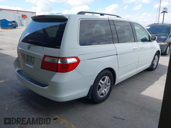 2007 Honda Odyssey EX-L with VIN 5FNRL38787B144585, listed as a IAAI auction lot 42139957 with 211,412 mi miles and . Bid and sale history available at DreamBid. Image 4.