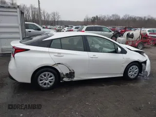 2019 Toyota Prius L Eco z VIN JTDKARFU8K3081187, wystawiony jako IAAI lot #41771346 z przebiegiem 64 864 mil mil oraz . Historia ofert i sprzedaży dostępna na DreamBid. Obrazek 13.