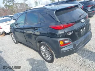 2021 Hyundai Kona SEL with VIN KM8K22AA1MU605029, listed as a IAAI auction lot 41478328 with 57,429 mi miles. Bid and sale history available at carsss.com. Image 3.