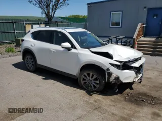 2020 Mazda CX-5 Grand Touring with VIN JM3KFBDM7L1851699, listed as a Copart auction lot 56475715 with Not Provided miles and Salvage Title. Bid and sale history available at DreamBid. Image 4.