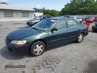 1998 Honda Accord EX with VIN 1HGCG5656WA090347, listed as a Copart auction lot 65795855 with 244,219 mi miles and Clean title. Bid and sale history available at DreamBid. Image 1.