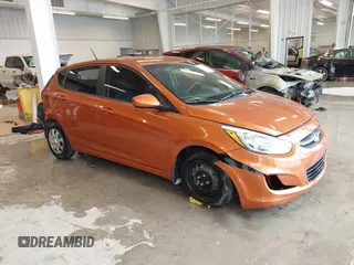 2015 Hyundai Accent GS with VIN KMHCT5AE6FU211955, listed as a IAAI auction lot 41610857 with 106,497 mi miles. Bid and sale history available at carsss.com. Image 1.
