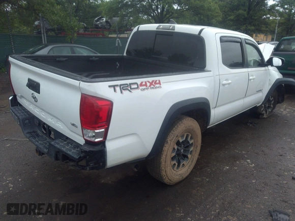 2017 Toyota Tacoma SR5 with VIN 3TMCZ5AN0HM099549, listed as a IAAI auction lot 33153884 with 58,517 mi miles and . Bid and sale history available at DreamBid. Image 3.