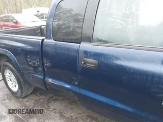 2002 Dodge Dakota Sport with VIN 1B7GL32X12S561414, listed as a IAAI auction lot 42060300 with 235,957 mi miles. Bid and sale history available at carsss.com. Image 6.