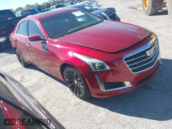 2016 Cadillac CTS Luxury Collection AWD with VIN 1G6AX5SXXG0100952, listed as a IAAI auction lot 41736200 with 123,495 mi miles and . Bid and sale history available at DreamBid. Image 1.