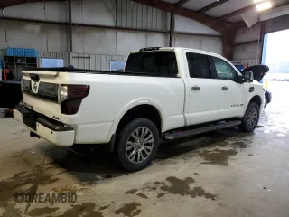 2017 Nissan Titan Pro-4X with VIN 1N6BA1F46HN574314, listed as a Copart auction lot 55573985 with 98,812 mi miles and Salvage title. Bid and sale history available at DreamBid. Image 3.