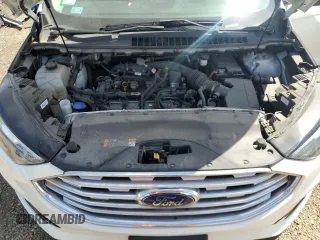 2020 Ford Edge SEL z VIN 2FMPK4J93LBB19642, wystawiony jako Copart lot #56647095 z przebiegiem 29 638 mil mil oraz Szkoda całkowita • Salvage title. Historia ofert i sprzedaży dostępna na DreamBid. Obrazek 12.