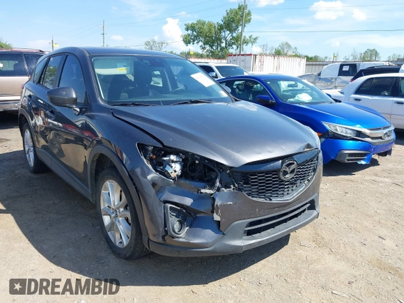 2014 Mazda CX-5 Grand Touring with VIN JM3KE2DY8E0383206, listed as a IAAI auction lot 40205756 with 120,231 mi miles. Bid and sale history available at carsss.com. Image 6.