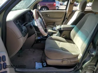 2002 Mazda Tribute LX with VIN 4F2YU09122KM62196, listed as a Copart auction lot 77327034 with 256,385 mi miles and Salvage Title. Bid and sale history available at carsss.com. Image 7.