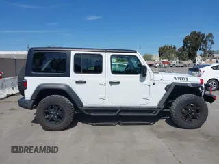 2022 Jeep Wrangler Unlimited Sport S with VIN 1C4HJXDG7NW144634, listed as a IAAI auction lot 41975242 with 29,336 mi miles. Bid and sale history available at carsss.com. Image 13.