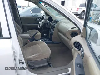 2004 Hyundai Santa Fe GLS with VIN KM8SC13DX4U609921, listed as a IAAI auction lot 41619492 with 113,592 mi miles. Bid and sale history available at carsss.com. Image 5.