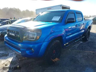 2011 Toyota Tacoma with VIN 5TFLU4EN1BX004646, listed as a IAAI auction lot 41433676 with 185,135 mi miles. Bid and sale history available at carsss.com. Image 2.