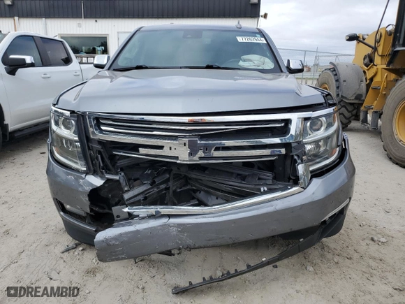 2020 Chevrolet Suburban Premier with VIN 1GNSCJKC3LR140399, listed as a Copart auction lot 77262944 with 69,901 mi miles and Salvage Title. Bid and sale history available at carsss.com. Image 5.
