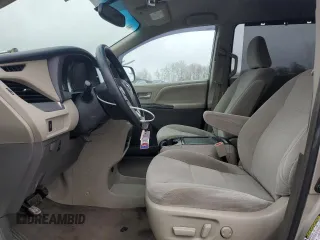 2017 Toyota Sienna LE with VIN 5TDJZ3DC8HS149992, listed as a Copart auction lot 51878725 with 90,299 mi miles and Salvage title. Bid and sale history available at DreamBid. Image 7.