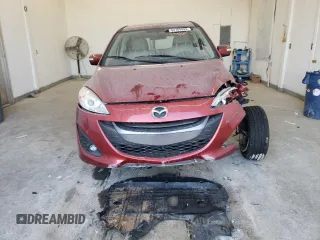 2015 Mazda 5 Touring with VIN JM1CW2CL7F0179885, listed as a Copart auction lot 82764993 with 31,306 mi miles and Salvage Title. Bid and sale history available at carsss.com. Image 5.