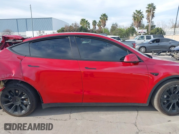2023 Tesla Model Y Long Range with VIN 7SAYGAEE7PF713761, listed as a IAAI auction lot 41638067 with 46,089 mi miles and . Bid and sale history available at DreamBid. Image 13.