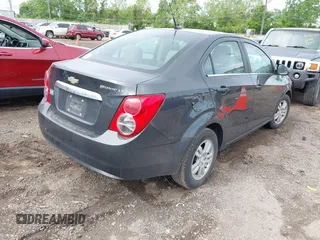 2014 Chevrolet Sonic LT with VIN 1G1JC5SH8E4235864, listed as a IAAI auction lot 42247217 with 150,057 mi miles and . Bid and sale history available at DreamBid. Image 4.