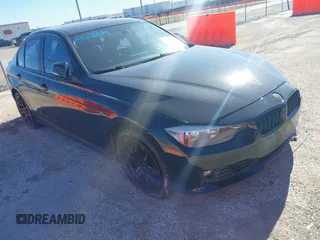 2015 BMW 3 Series 328i with VIN WBA3A5C58FF609161, listed as a IAAI auction lot 41162704 with 117,190 mi miles. Bid and sale history available at carsss.com. Image 1.