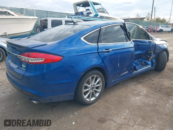 2017 Ford Fusion Titanium with VIN 3FA6P0SUXHR238980, listed as a IAAI auction lot 41890248 with 64,392 mi miles and . Bid and sale history available at DreamBid. Image 4.