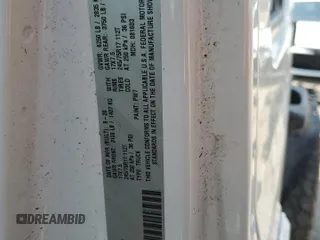 2020 Jeep Gladiator Sport S z VIN 1C6JJTAG3LL215977, wystawiony jako Copart lot #55012635 z przebiegiem Nie podano mil oraz Szkoda całkowita • Salvage title. Historia ofert i sprzedaży dostępna na DreamBid. Obrazek 13.