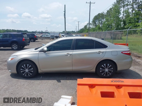 2016 Toyota Camry XLE with VIN 4T1BF1FKXGU259860, listed as a IAAI auction lot 42219507 with 239,145 mi miles and . Bid and sale history available at DreamBid. Image 14.