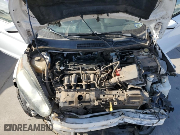 2015 Ford Fiesta S z VIN 3FADP4AJ4FM123484, wystawiony jako Copart lot #54095345 z przebiegiem 63 123 mil mil oraz Szkoda całkowita • Salvage title. Historia ofert i sprzedaży dostępna na DreamBid. Obrazek 11.