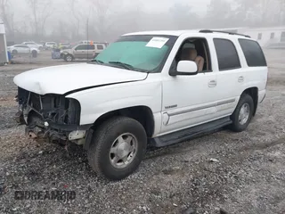 2003 GMC Yukon SLT with VIN 1GKEC13Z33R175358, listed as a IAAI auction lot 41801299 with 269,167 mi miles. Bid and sale history available at carsss.com. Image 2.