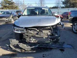 2021 Volkswagen Tiguan S with VIN 3VV1B7AX7MM005980, listed as a Copart auction lot 42827715 with 34,940 mi miles and Salvage Title. Bid and sale history available at carsss.com. Image 5.