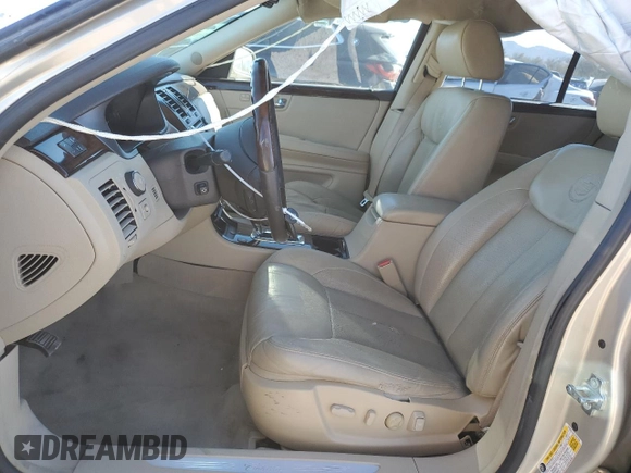2007 Cadillac DTS Performance z VIN 1G6KD57907U187194, wystawiony jako Copart lot #79310374 z przebiegiem 108 144 mil mil oraz Szkoda całkowita • Salvage title. Historia ofert i sprzedaży dostępna na DreamBid. Obrazek 7.