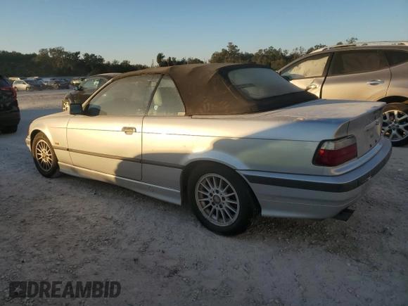 1998 BMW 3 Series z VIN WBABK8330WEY89818, wystawiony jako Copart lot #41557015 z przebiegiem 253 522 mil mil oraz Nie do naprawy • Non repairable. Historia ofert i sprzedaży dostępna na DreamBid. Obrazek 2.