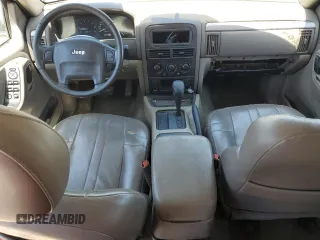 2004 Jeep Grand Cherokee Laredo z VIN 1J4GX48N54C371073, wystawiony jako Copart lot #52202855 z przebiegiem 212 368 mil mil oraz Szkoda całkowita • Salvage title. Historia ofert i sprzedaży dostępna na DreamBid. Obrazek 8.