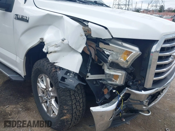 2015 Ford F-150 XLT with VIN 1FTFX1EFXFFC18381, listed as a IAAI auction lot 41886719 with 162,644 mi miles and . Bid and sale history available at DreamBid. Image 6.