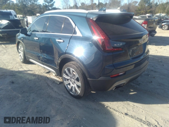 2019 Cadillac XT4 FWD Premium Luxury with VIN 1GYFZCR41KF202167, listed as a IAAI auction lot 35653161 with 64,132 mi miles and . Bid and sale history available at DreamBid. Image 3.