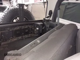 2020 Jeep Wrangler Sport S with VIN 1C4GJXAN4LW229040, listed as a IAAI auction lot 42172180 with 58,701 mi miles and . Bid and sale history available at DreamBid. Image 8.