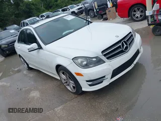 2014 Mercedes-Benz C 250 Sport with VIN WDDGF4HB1EA934119, listed as a IAAI auction lot 42489807 with 159,405 mi miles and . Bid and sale history available at DreamBid. Image 1.