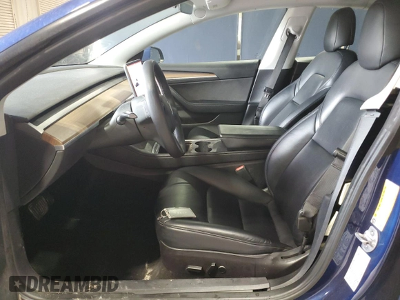 2022 Tesla Model 3 with VIN 5YJ3E1EA7NF369551, listed as a Copart auction lot 55610805 with 128,311 mi miles and Clean Title. Bid and sale history available at DreamBid. Image 7.