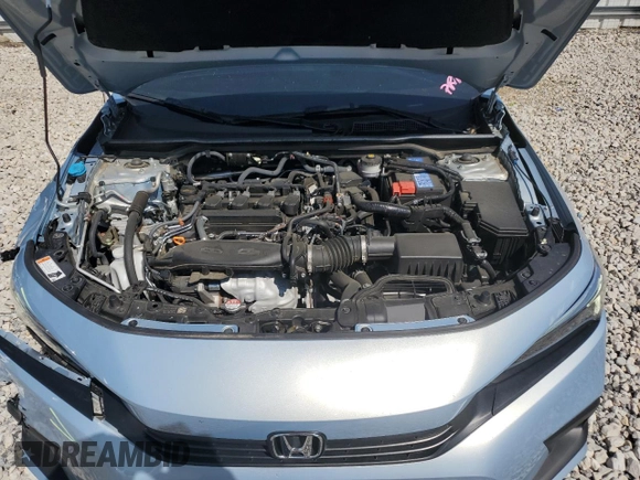 2023 Honda Civic Touring z VIN 2HGFE1F94PH310134, wystawiony jako Copart lot #52311085 z przebiegiem 32 682 mil mil oraz Szkoda całkowita • Salvage title. Historia ofert i sprzedaży dostępna na DreamBid. Obrazek 11.