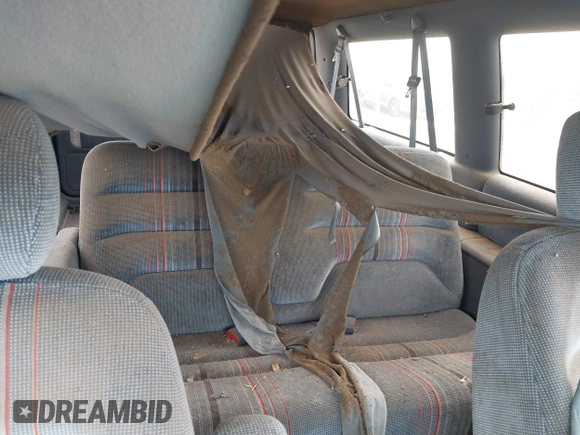 1991 Dodge Grand Caravan with VIN 1B4GK54R4MX558183, listed as a IAAI auction lot 41604086 with 210,400 mi miles and . Bid and sale history available at DreamBid. Image 8.