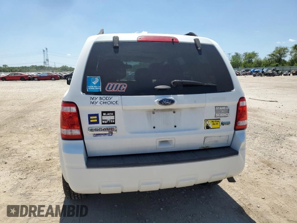2012 Ford Escape XLT z VIN 1FMCU9DG3CKA09843, wystawiony jako Copart lot #63585395 z przebiegiem Nie podano mil oraz Szkoda całkowita • Salvage title. Historia ofert i sprzedaży dostępna na DreamBid. Obrazek 6.